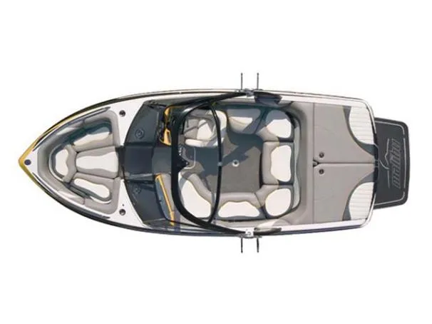Slide: The Image of 2008 Malibu Wakesetter VTX boat docked on a sunny lake with clear skies. - 13
