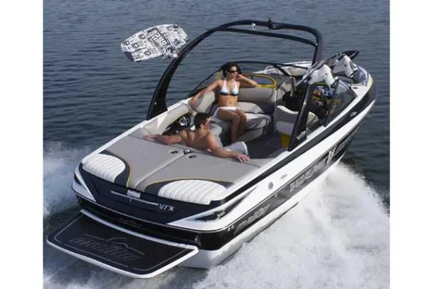 Slide: The Image of Engine compartment of a 2008 Malibu Wakesetter VTX boat. - 12