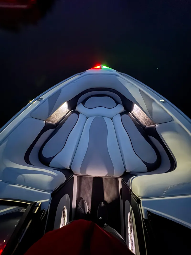 Slide: The Image of 2008 Malibu Wakesetter VTX boat interior with illuminated seating and sleek design. - 7