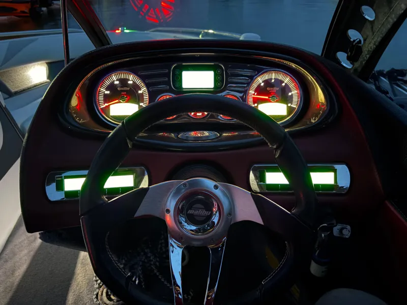 Slide: The Image of 2008 Malibu Wakesetter VTX boat interior with illuminated seating at night. - 8