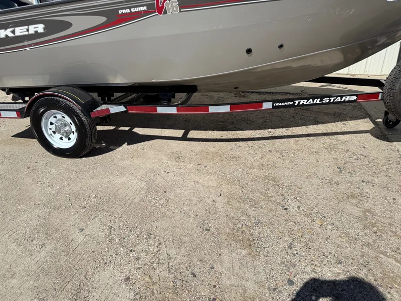 Slide: The Image of 2005 Bass Tracker PGV16 boat on a Tracker Trailstar trailer. - 21
