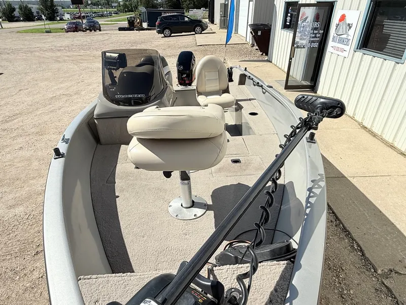 Slide: The Image of 2005 Bass Tracker PGV16 fishing boat with seating and trolling motor. - 3