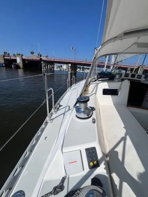 Slide: The Image of Sailing on a 1998 J Boats J/42 yacht near a bridge on a sunny day. - 22