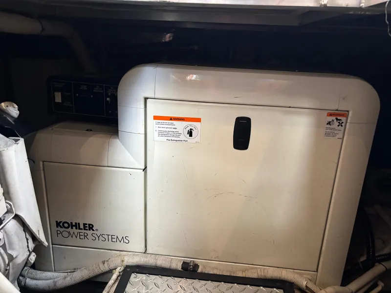 Slide: The Image of Kohler power system in 2003 Carver 444 Cockpit Motor Yacht engine room. - 43