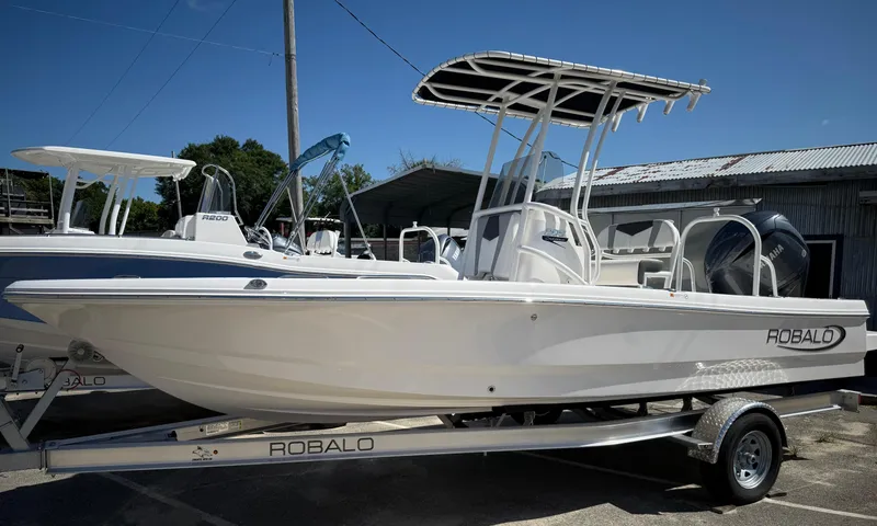 The Image of 2025 Robalo 206 Cayman boat on trailer, featuring sleek design and modern features. - 0