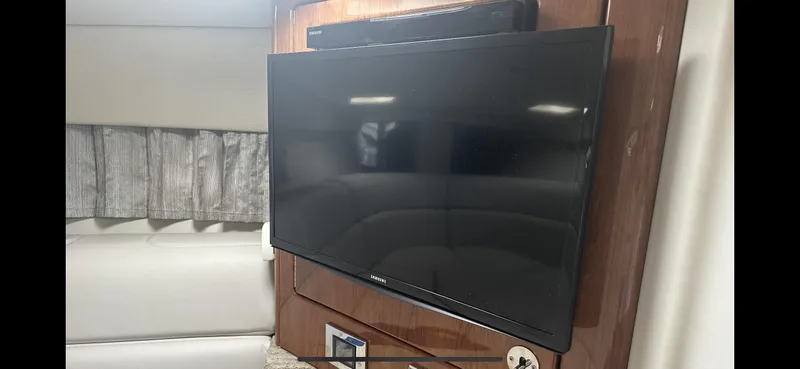 Slide: The Image of Flat-screen TV inside 2018 Formula 370 Super Sport boat cabin. - 15