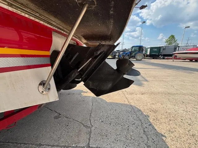 Slide: The Image of 2002 Four Winns 190 Horizon boat propeller and stern, parked on concrete. - 3