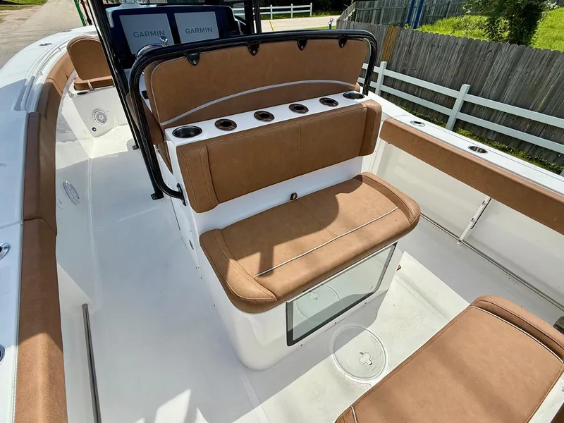 Slide: The Image of 2023 Sea Hunt Gamefish 27 boat with forward seating and Garmin displays. - 9