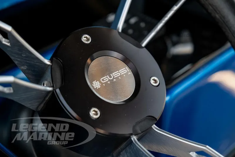 Slide: The Image of Steering wheel detail of 2023 Statement 350 Open boat, featuring Gussi Italia design. - 17