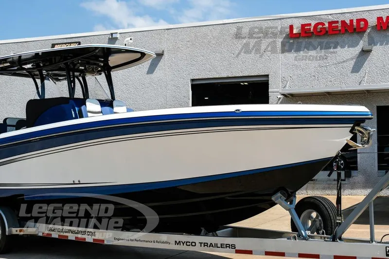 Slide: The Image of 2023 Statement 350 Open boat on trailer outside Legend Marine building. - 2