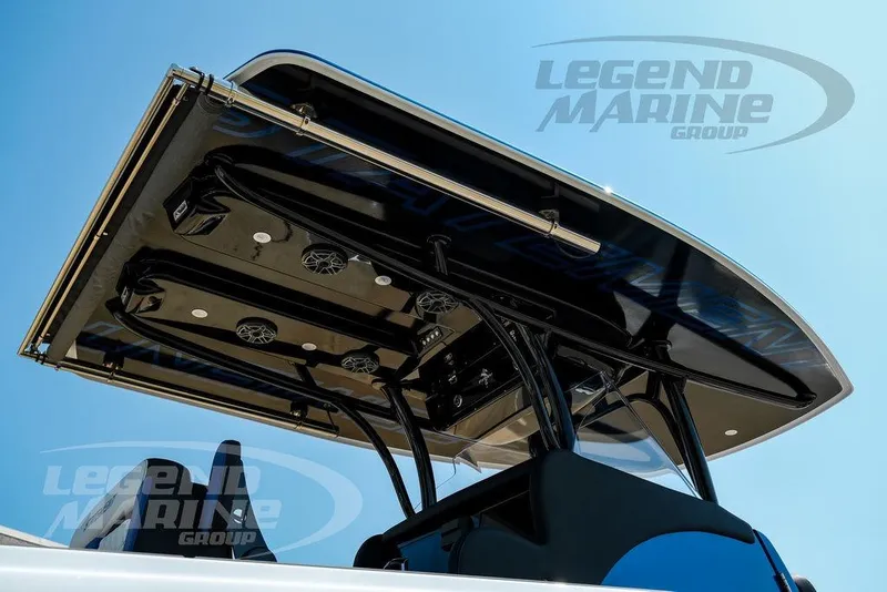 Slide: The Image of 2023 Statement 350 Open boat with sleek black canopy and integrated speakers. - 21