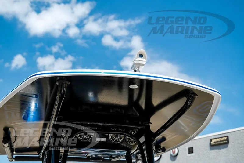 Slide: The Image of 2023 Statement 350 Open boat canopy against blue sky, featuring Legend Marine Group branding. - 22