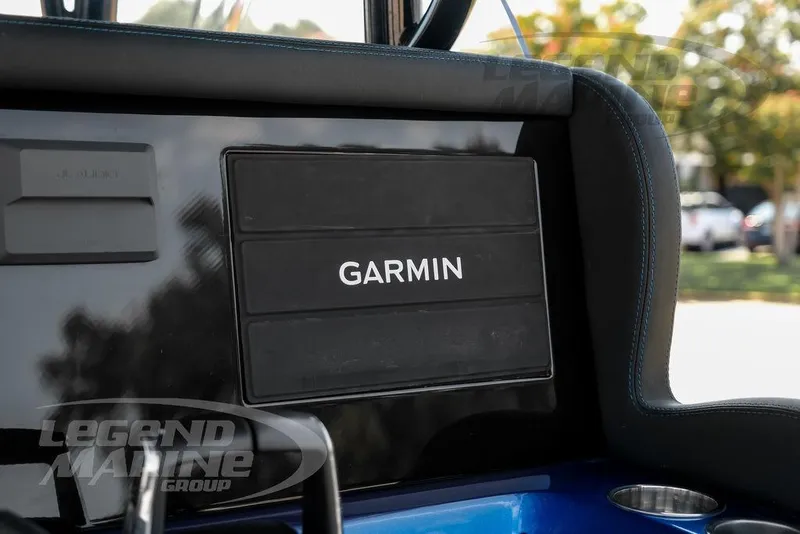 Slide: The Image of Garmin display on 2023 Statement 350 Open boat dashboard, featuring Legend Marine Group branding. - 27