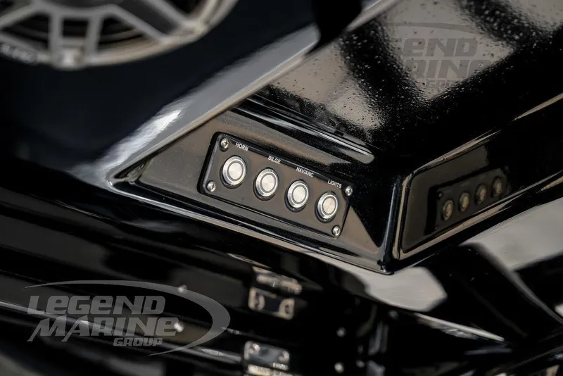 Slide: The Image of Control panel on 2023 Statement 350 Open boat with horn, bilge, nav/anc, and lights buttons. - 29