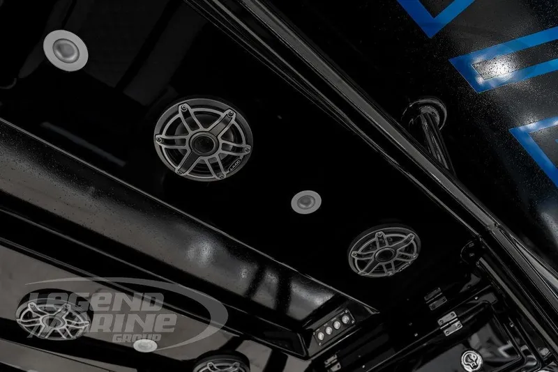 Slide: The Image of 2023 Statement 350 Open boat speakers and lighting on sleek black interior. - 33