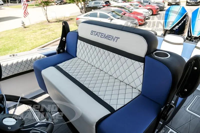 Slide: The Image of 2023 Statement 350 Open boat seat with quilted design and cup holder. - 34