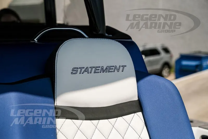 Slide: The Image of 2023 Statement 350 Open boat seat with blue and white upholstery. - 39