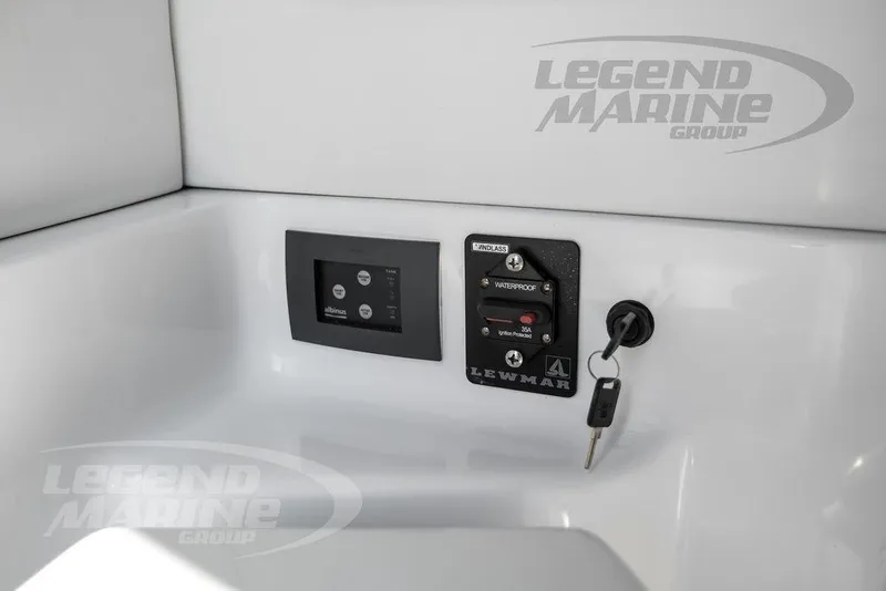 Slide: The Image of Control panel of 2023 Statement 350 Open boat with key and Lewmar windlass switch. - 42