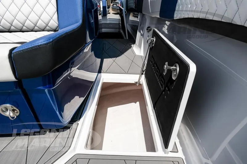 Slide: The Image of 2023 Statement 350 Open boat interior with open storage compartment and cushioned seating. - 43