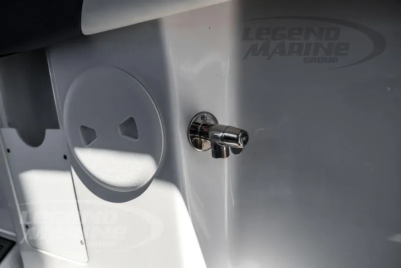 Slide: The Image of 2023 Statement 350 Open boat detail with metal fitting and shadowed surface. - 46