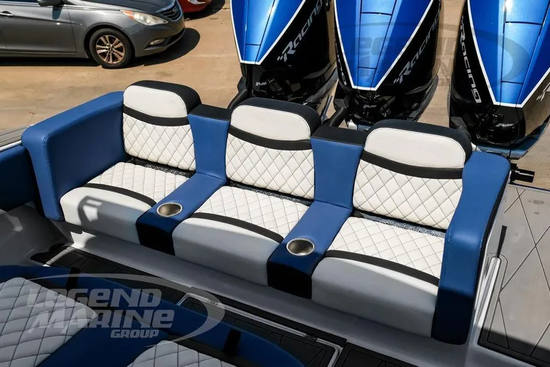 Slide: The Image of Luxury seating on 2023 Statement 350 Open boat with blue and white upholstery. - 54