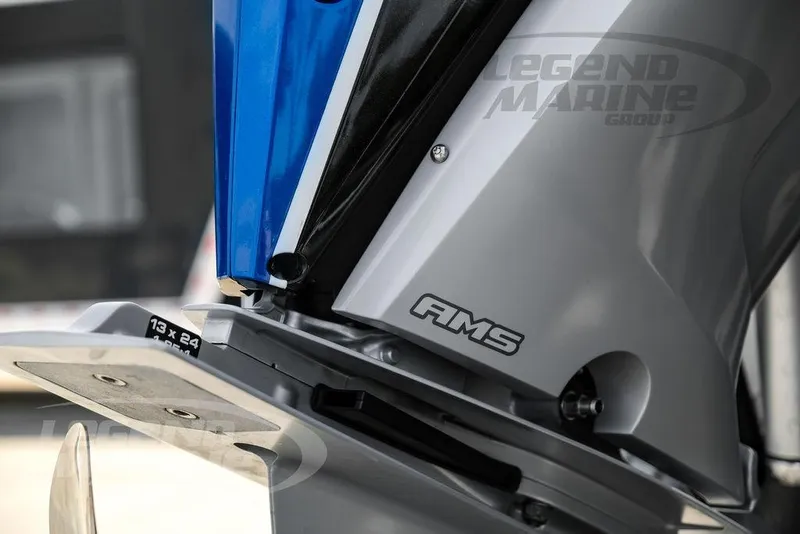 Slide: The Image of Close-up of 2023 Statement 350 Open boat engine with AMS branding. - 59