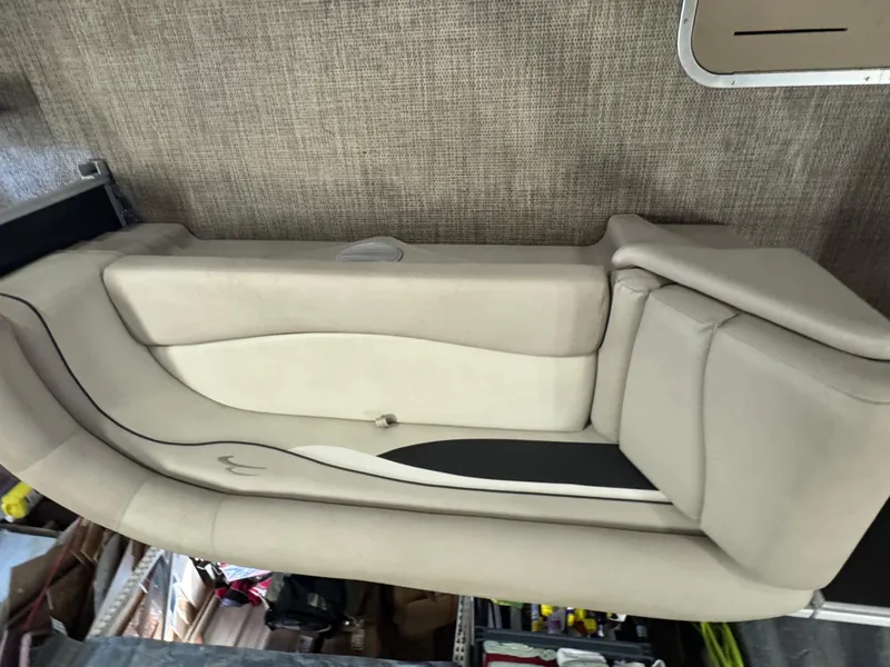 Slide: The Image of 2019 Bennington S21 boat interior seating, beige upholstery, modern design. - 9