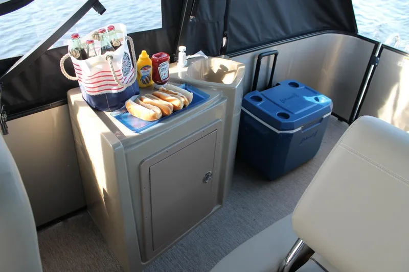 Slide: The Image of Manufacturer Provided Image: 2022 Sylvan Mirage 8522 Resorter interior with snacks and drinks setup. - 14