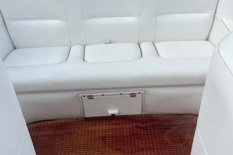 Slide: The Image of Interior seating of 2000 Cigarette Top Gun T/S 38 boat with white upholstery. - 7