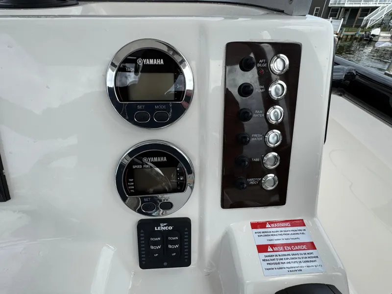 Slide: The Image of Control panel of 2021 Robalo R222 Explorer boat with Yamaha gauges and switches. - 7