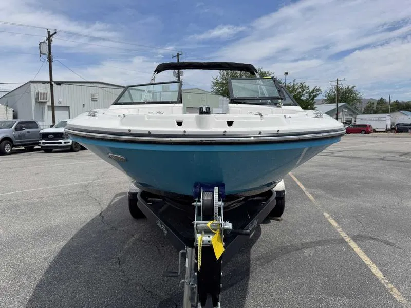 Slide: The Image of 2022 Sea Ray SPX 190 boat on trailer in parking lot, front view. - 6