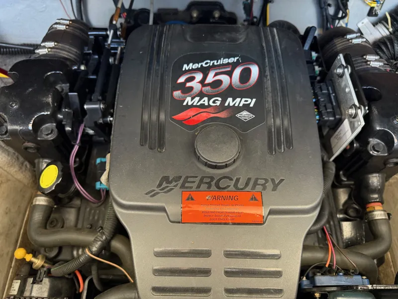 Slide: The Image of MerCruiser 350 MAG MPI engine in 2004 Crownline 266 BR boat. - 21