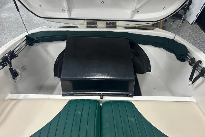 Slide: The Image of 2001 Sea-Doo Utopia 185 boat interior with open engine compartment. - 11