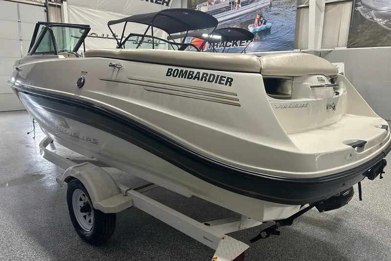 Slide: The Image of 2001 Sea-Doo Utopia 185 boat on trailer in indoor showroom. - 3