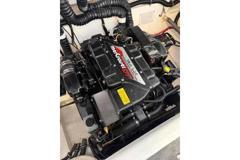 Slide: The Image of Engine of a 1996 Formula 280 Sun Sport boat, featuring a MerCruiser 7.4L motor. - 29