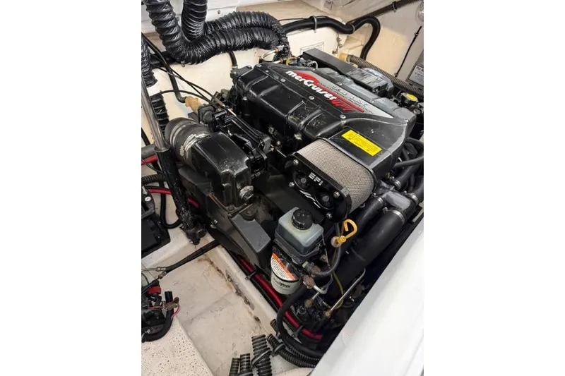Slide: The Image of Engine of a 1996 Formula 280 Sun Sport boat, featuring MerCruiser components. - 32