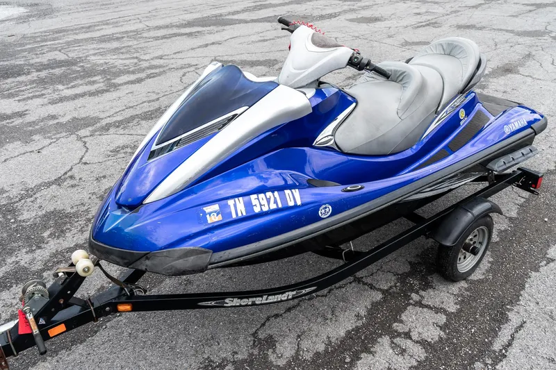 Slide: The Image of 2007 Yamaha WaveRunner FX Cruiser HO on trailer, blue and silver design. - 4