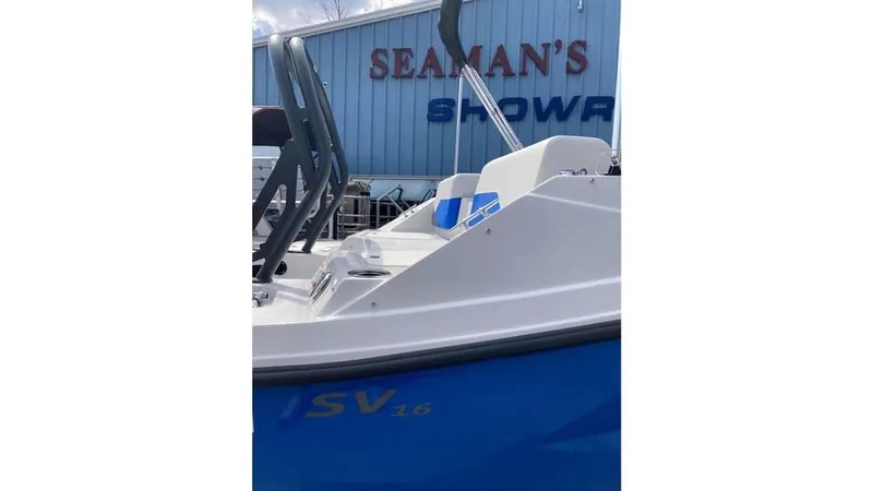 Slide: The Image of 2025 Starcraft SV 16 OB boat displayed at Seaman's showroom. - 7