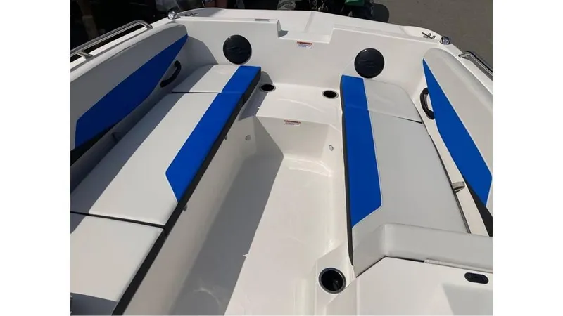 Slide: The Image of 2025 Starcraft SV 16 OB boat interior with blue and white seating. - 8