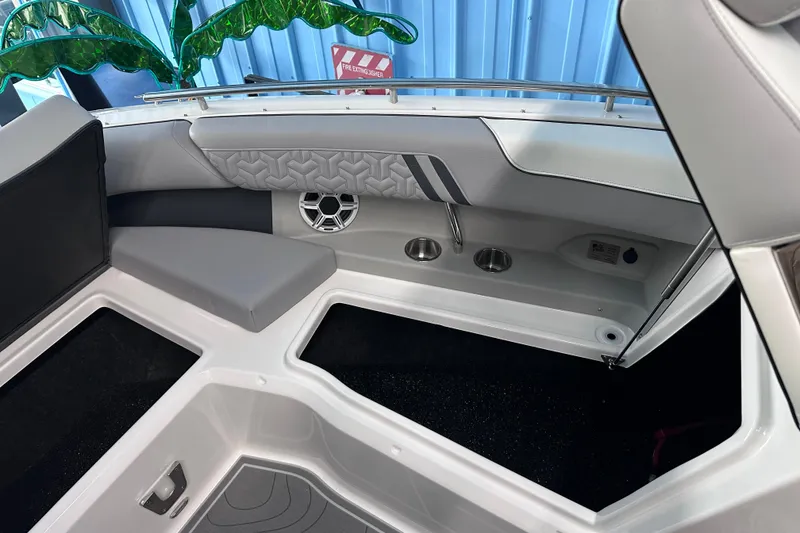 Slide: The Image of Interior of 2026 Regal LX9 boat with modern seating and speaker system. - 22