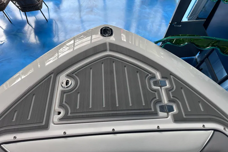 Slide: The Image of 2026 Regal LX9 boat deck with sleek gray non-slip surface. - 23