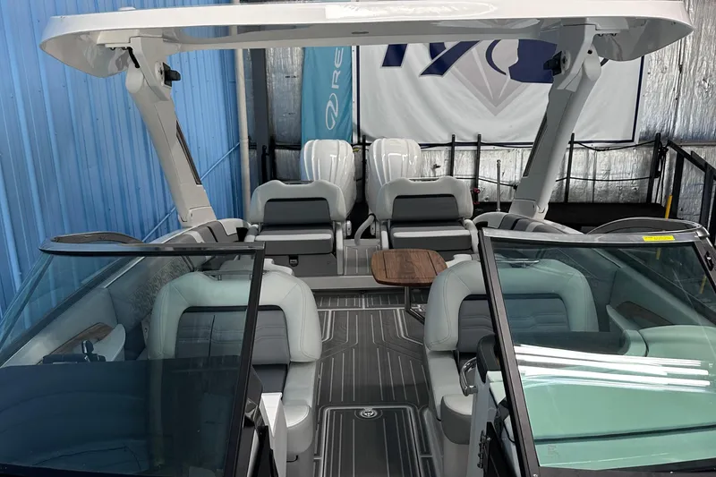 Slide: The Image of 2026 Regal LX9 boat interior with modern seating and sleek design. - 26