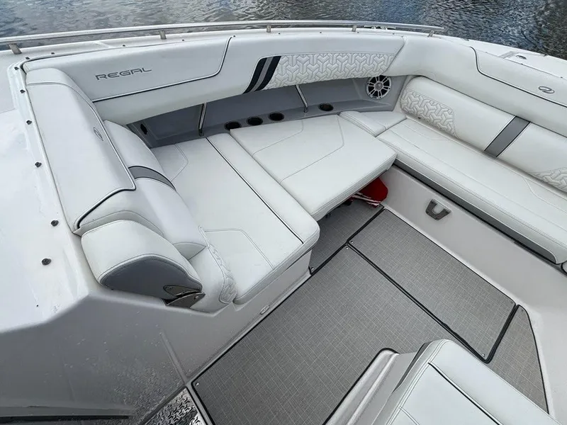 Slide: The Image of Luxurious interior of 2022 Regal LX36 boat with white seating and elegant design. - 3