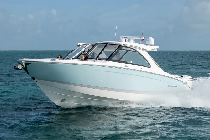 Slide: The Image of Manufacturer Provided Image: 2022 Regal LX36 boat cruising on open water. - 7