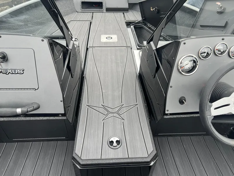 Slide: The Image of 2025 Vexus ADX 200 boat interior with sleek dashboard and modern controls. - 11