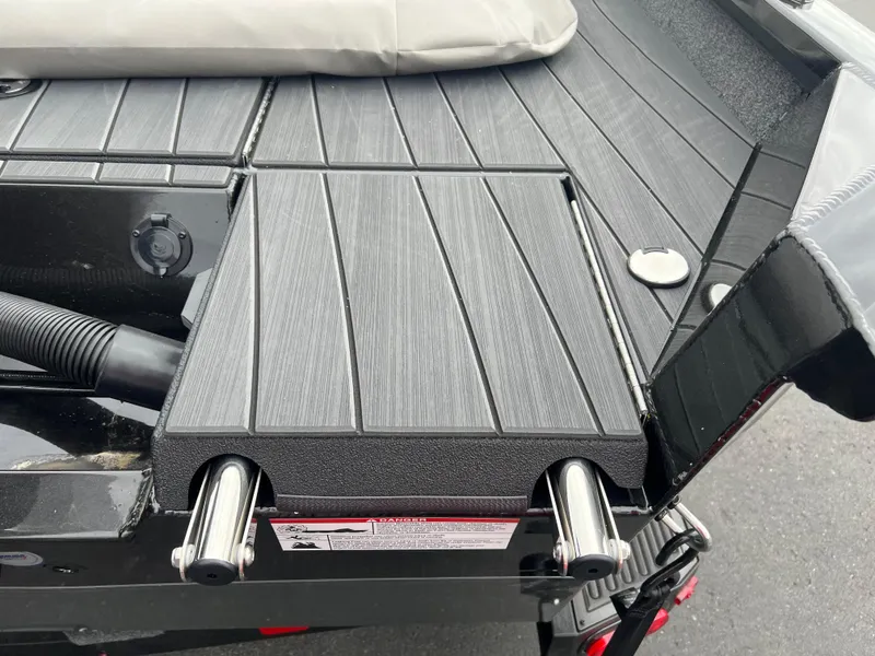 Slide: The Image of Vexus ADX 200 (2025) boat deck with retractable ladder and sleek design. - 19