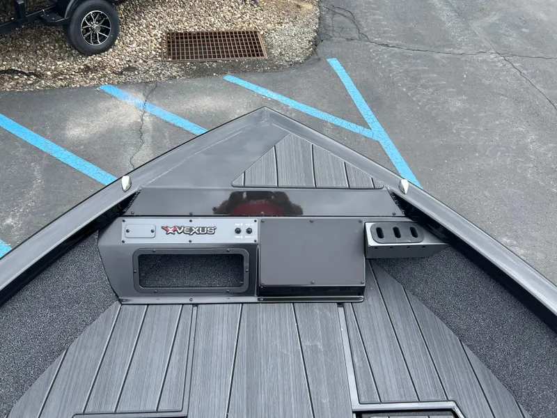 Slide: The Image of Bow view of 2025 Vexus ADX 200 boat with sleek deck design. - 6