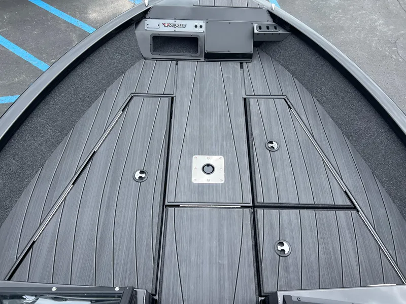 Slide: The Image of 2025 Vexus ADX 200 boat deck with sleek, modern design and storage compartments. - 7