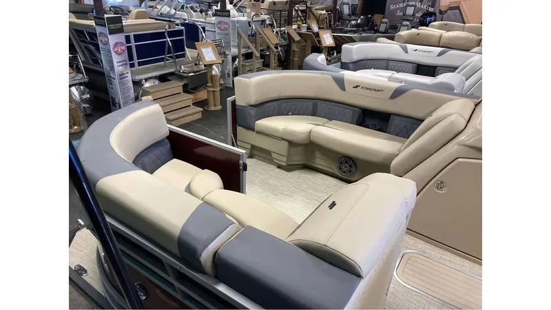 Slide: The Image of 2024 Starcraft CX 23 DL BAR pontoon boat with luxurious seating and modern design. - 11