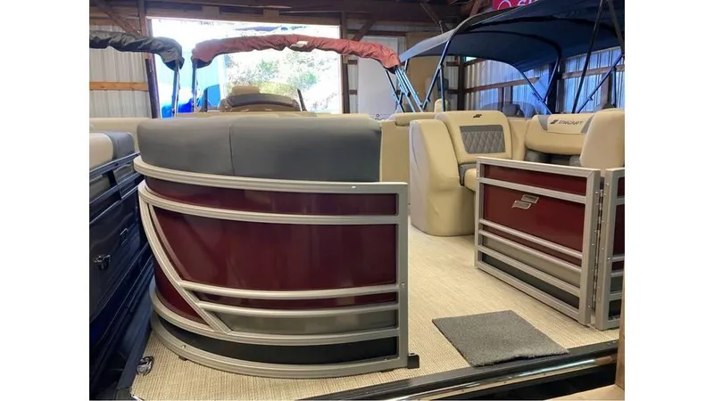 Slide: The Image of 2024 Starcraft CX 23 DL BAR pontoon boat with luxurious seating and sleek design. - 12